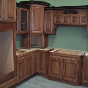 Wooden kitchen cabinets and countertops in a newly designed kitchen space